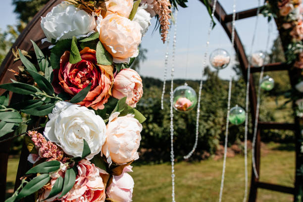 istock Floral decor wedding arch with roses 1288878462