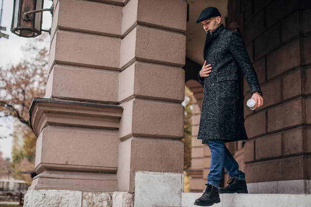 istock Young man walking down the stairs in the city 1288881346
