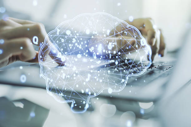 istock Double exposure of creative artificial Intelligence symbol with hands typing on laptop on background. Neural networks and machine learning concept 1288881652