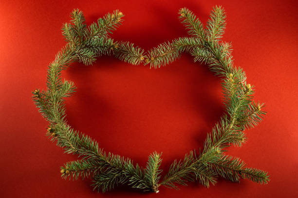 istock Creative layout with heart shaped Christmas branche 1288884446