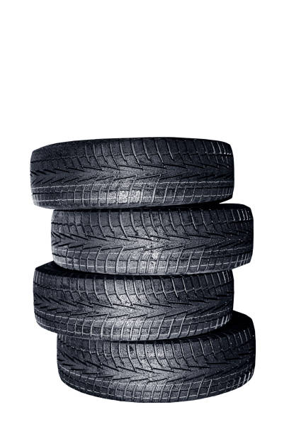 istock Car tires pile on a white background 1288889722