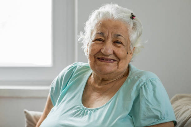 istock Old woman with gray hair 1288890094