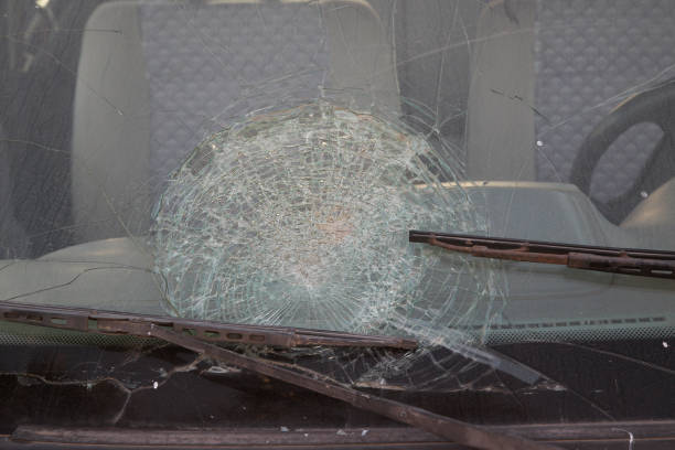 istock cracked the front window of the car 1288891030