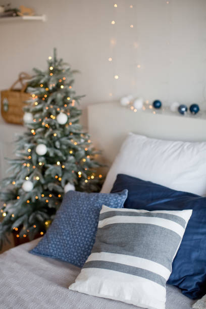 istock Light Christmas bedroom with decorations 1288893738