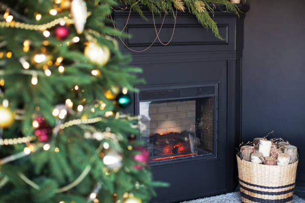 istock Dark Christmas fireplace with Christmas tree 1288893750