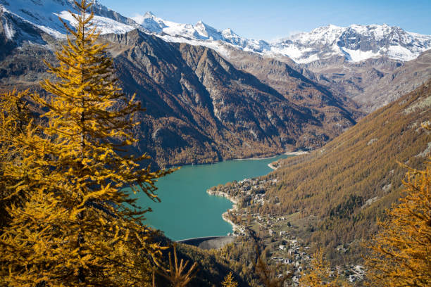 Scenic autumn mountains landscape with alpine lake. Gran Paradiso National Park. Italy stock photo