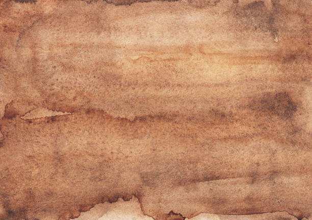 istock Watercolor old brown background texture. Ancient parchment backdrop hand painted. Light taupe color overlay. 1288894696