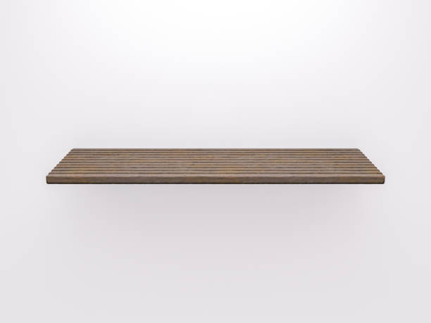 istock Wooden board - dark colored shelf on white wall 1288894907