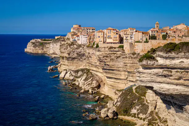 Old Town of bonifacio, dramatically siutated atop an eroding limestone promontory. Corsica, France.