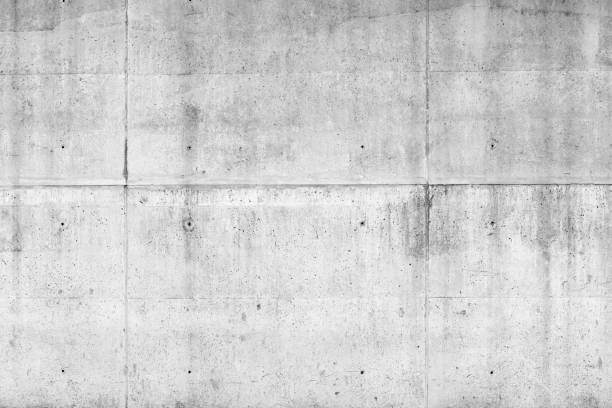 istock White grungy concrete wall, background texture 1288895583