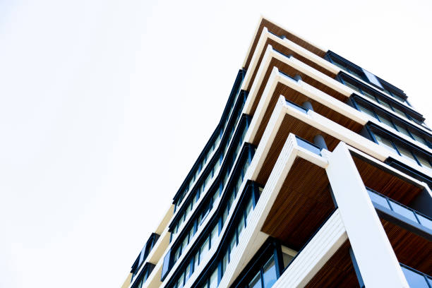 istock Modern apartment building, low angle view, sky background with copy space 1288896892