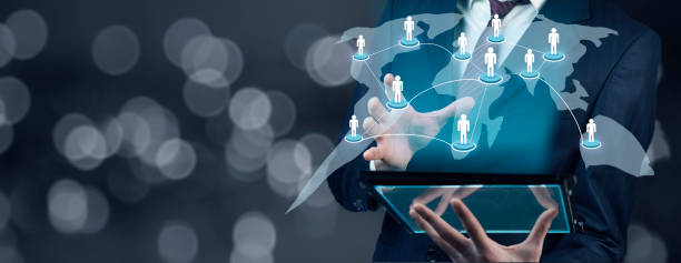 istock man holding tablet with touching social network 1288900501