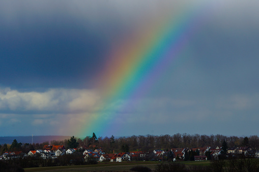 Rainbow over a village