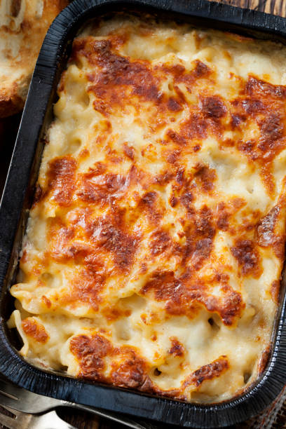 istock Take Out Creamy Chicken Alfredo Lasagna with Garlic Bread 1288904465
