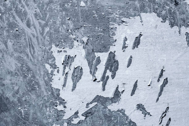 concrete wall with removed old paint and lime mechanically close up