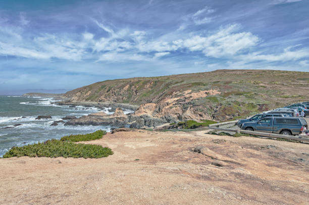 Bodega Bay Parking Lot by Ocean with vehicles