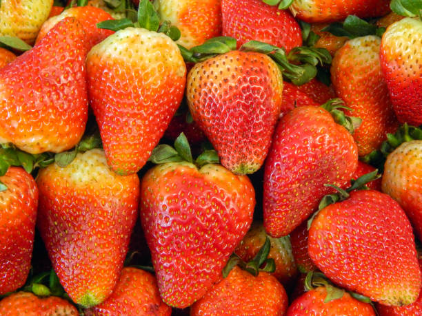istock Group of stacked strawberries 1288907433