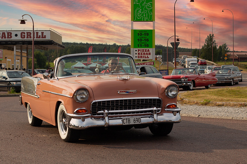 Rattvik, Sweden - July 27.2013: Classic Car Week Rttvik - Chevrolet Bel Air 1955, oldtimer car. Old convertible - vintage car, sunset.