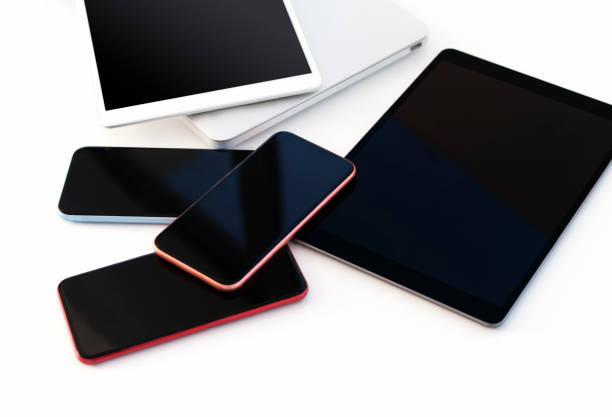 istock Digital displays, digital tablet and laptop, blank screens, white background 1288909253
