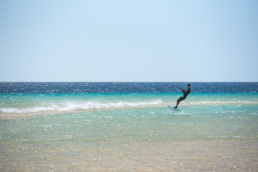 Le Morne, Mauritius - September 23, 2022: People enjoy kitesurfing close to the Beach of Le Morne in the South West of Mauritius.