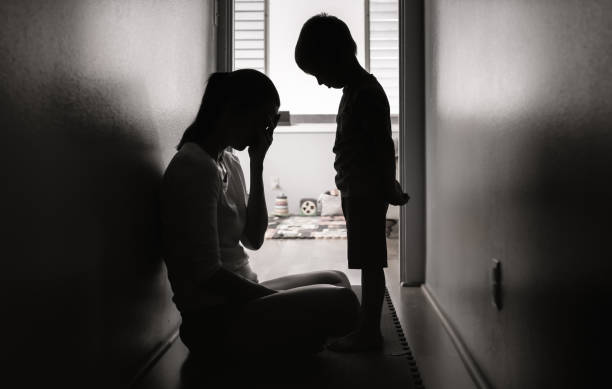 istock Crying unhappy mother with her son at home 1288911273