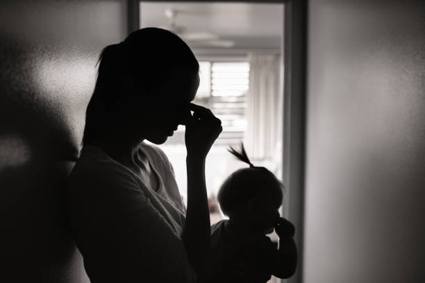 istock Stressed mother with her daughter at home 1288911648