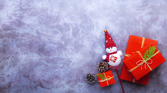 Christmas decoration on stone concrete background, copy space, flat lay
