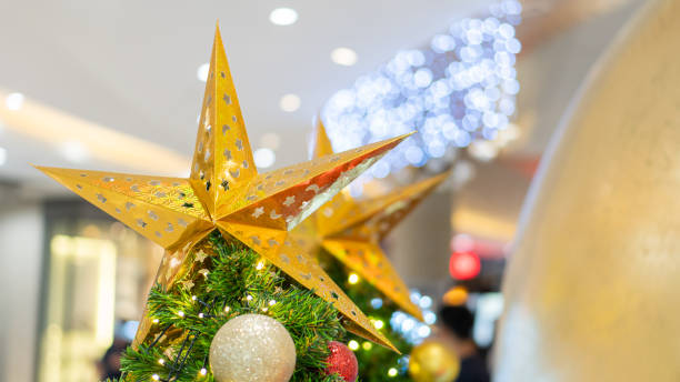 istock The stars on the pine tree Christmas ornaments with blurred background 1288919432