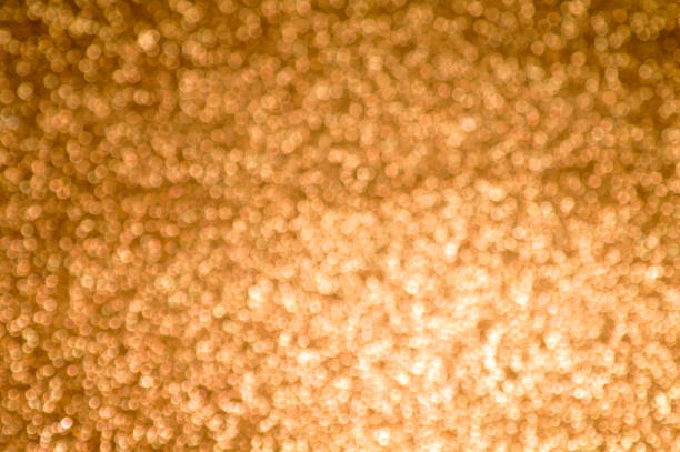 istock Abstract textured yellow multicolor blurred holiday background with bokeh, selective focus. 1288921081