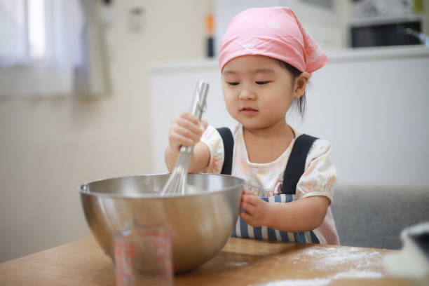 istock Girl cooking 1288926692