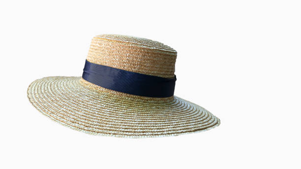 istock A beautiful white straw hat with black cloth on a white background. 1288926858