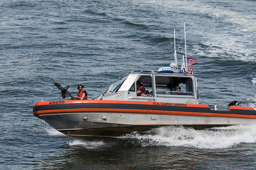 Charleston, SC, USA - February 28, 2024: Fort Riley, a 20-meter U.S. Coast Guard-certified emergency response craft owned by Southeast Ocean Response Services, sails into Charleston Harbor.