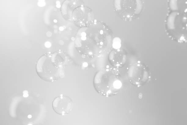 istock Beautiful shiny transparent blur a white soap bubbles float texture background. freshness natural summer background. 1288938588