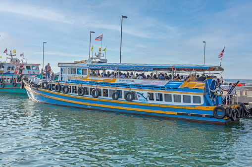 Chon buri, THAILAND - November 14, 2020: The boat at Ko Loi Sriracha Wharf with many people cross to Koh Sichang, It is one of the most popular in Chon buri.