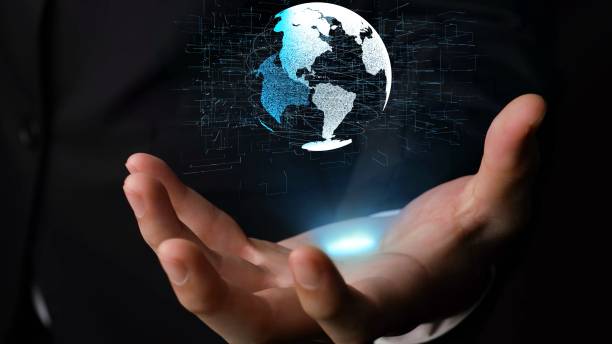 istock Human hand holding earth globe holographic technology 1288939832