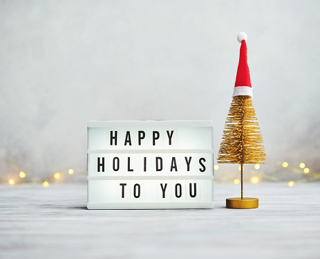 Gold Christmas Tree Holiday Background with Happy Holidays Message