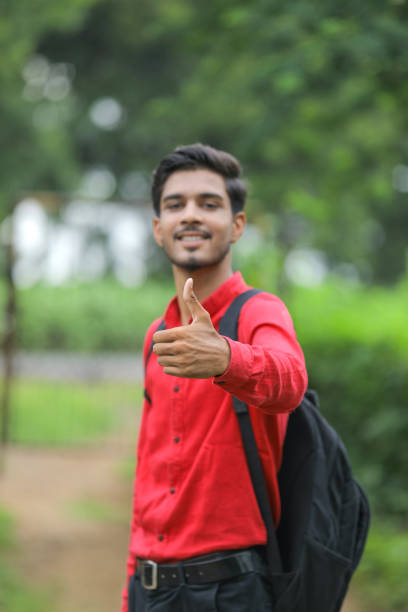 istock Young Indian college student showing thumps up 1288944853