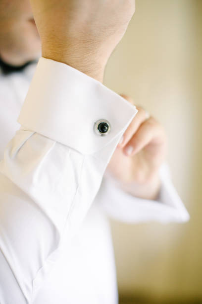 Groom tying cufflinks. Preparations for the wedding day. in İstanbul, İstanbul, Turkey