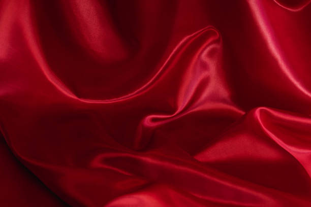 istock Red  color glossy  cloth for background. 1288947382