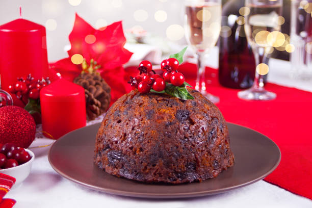 istock Traditional Christmas pudding with holly on top. 1288948471