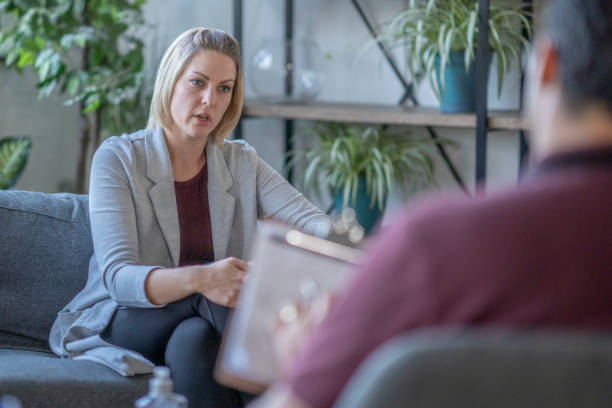 istock Counsellor meeting with a female patient 1288950049