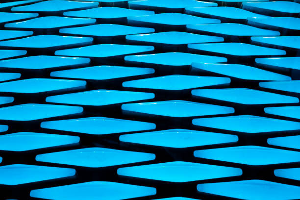 istock Futuristic blue diamond shape background. Blue rombic shape illumination. 1288953825