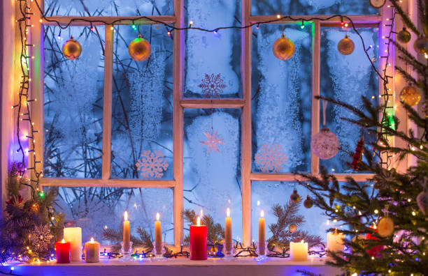 istock Christmas decorations on old wooden window 1288957670