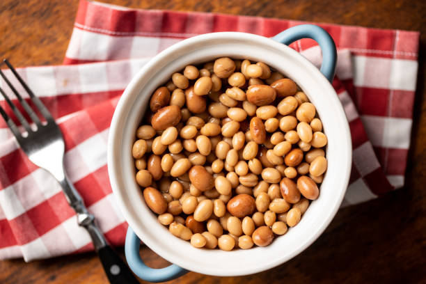 istock Mix of legume beans and chickpeas with sauce. 1288958982