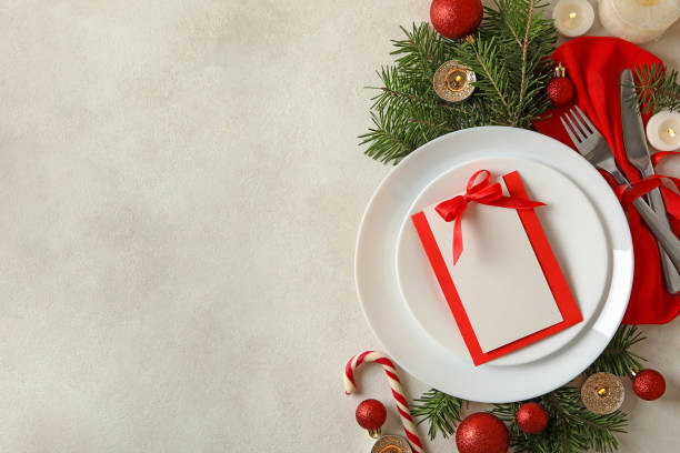 istock Concept of New year table setting on white background, space for text 1288959600