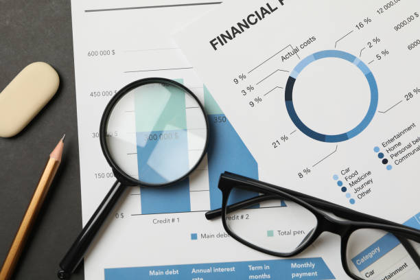istock Concept of financial planning with accessories, close up 1288959687