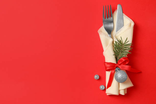 istock Napkin with New year cutlery on red background 1288959798