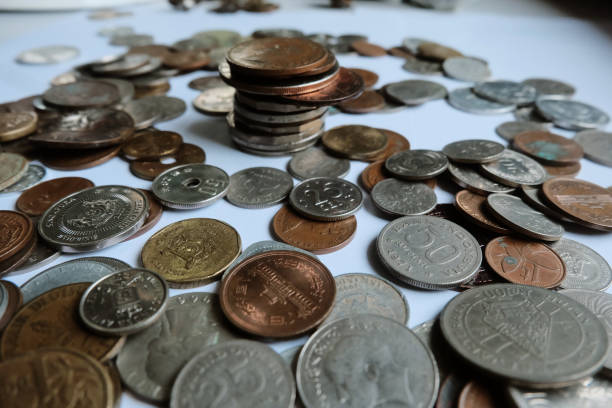 istock A bunch of coins from several country and time 1288960853
