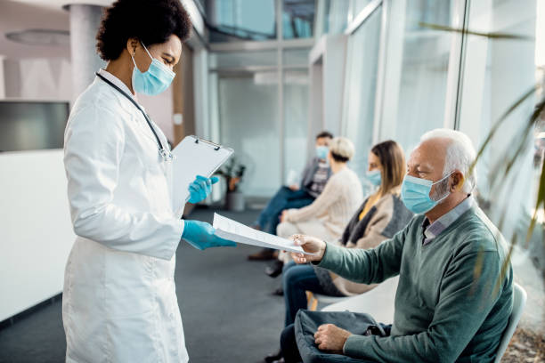 istock Here is your medical report, Sir! 1288962058