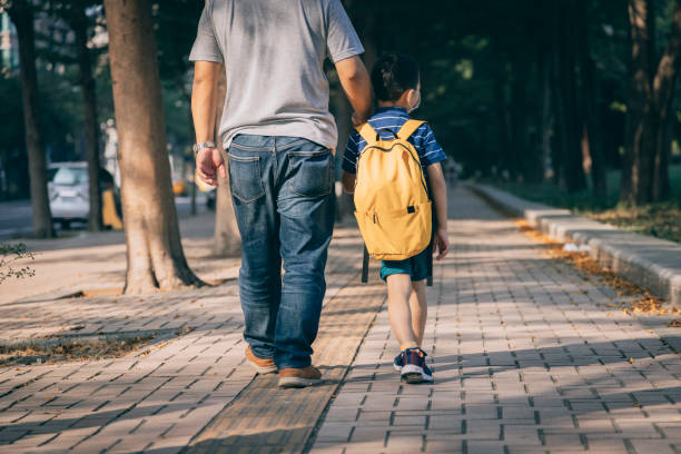 istock Father and son going to kindergarten 1288962068